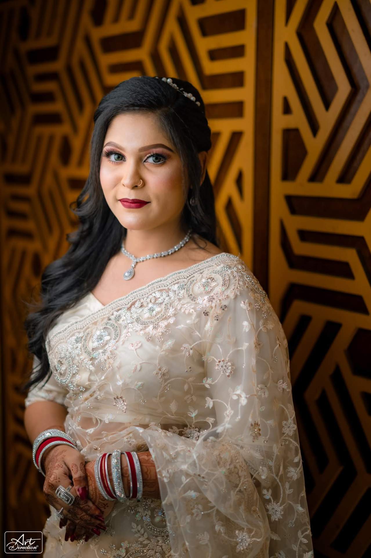 Bridal portrait in ivory saree